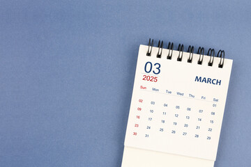 March 2025 Mini monthly desk calendar for 2025 year on blue color background.