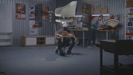 Fototapete - Modern workshop: Professional artisan or designer wearing VR headset assembles chair using extended reality and app with AI user interface. 3D graphics of holographic virtual furniture. VFX animation.