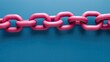 © Ramita - Technology information blockchain concept. A vibrant pink chain links against a solid blue background, showcasing a bold contrast and emphasizing strength and connection.