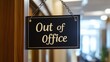 © Face Off Design - A black chalkboard sign saying 'Out Of Office'