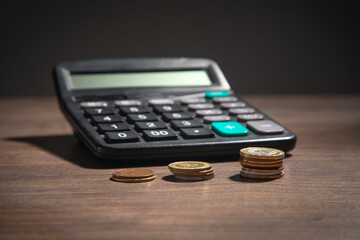 Wall Mural - Coins with calculator. Business. Finance