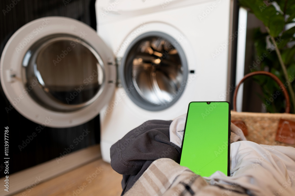 Greenscreen Washingn Machine Woman controls the washing machine via mobile phone with Wi-Fi and the ...