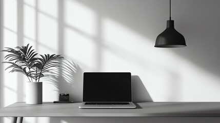 Poster - A laptop on a desk with a plant and a pendant lamp, in a minimalist office setting.
