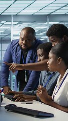 Poster - vertical video teamworking engineers talking in server room, developing disaster recovery plans ensu