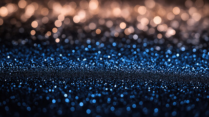 Poster - Sparkling Blue and Gold Bokeh Background for Festive Design. A captivating bokeh background featuring a gradient of shimmering gold and blue lights on a dark surface.