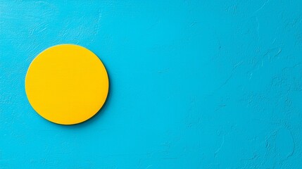 Poster - A yellow circular split pattern on a textured surface.