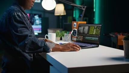 Poster - professional video editor analyzing film montage before editing color grading and lighting in creati