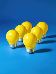 Wall Mural - Yellow light bulbs on blue surface