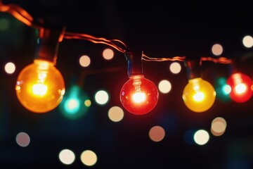 Poster - Colorful string lights on a dark background