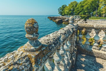 Poster - A stone fence running alongside a body of water, ideal for use in scenes with nature or rustic themes