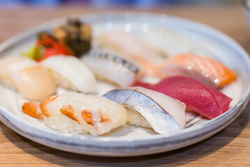 Wall Mural - Japanese sushi selection served with dipping sauces