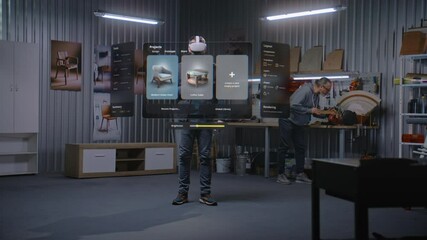 Fototapete - Modern workshop: Professional craftsman or designer wearing AR headset assembles chair in virtual space using app with AI user interface. 3D visualization of holographic furniture. Augmented reality.