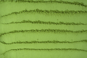 Matcha tea, matcha powder as a background.