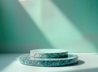 Aufkleber - Empty marble platform against mint green backdrop. Light streams onto platform creating shadows. Modern design studio display. Clean, elegant, product presentation space ideal for items. Product