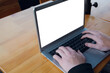 © SETO fotografias - unrecognizable man with vitiligo hands using laptop