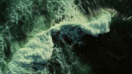 Poster - Serene Aerial View of Ocean Waves Crashing on Dark Water, Capturing the Beauty of Nature in Motion with Foamy White Crests and Deep Green Tones