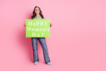 Photo of beautiful senior lady wearing casual outfit holding poster happy women day holiday isolated on pink color background