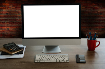 Fototapete - man working businessman using a desktop computer of the blank screen at the wooden working desk.