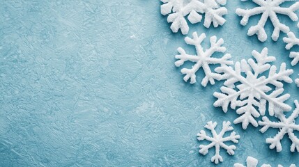 Wall Mural - Decorative Snowflakes on a Soft Blue Background for Winter Holiday Themes and Festive Designs