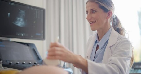 Aufkleber - Portrait of a Professional Female Obstetrician Discussing Fetal Health with Expectant Parent During an Ultrasound Appointment. Doctor Examining the Belly with a Transducer Tool
