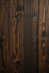 Wall Mural - A wooden surface with a grainy texture and a few holes