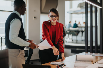 Wall Mural - A diverse group of business people are brainstorming and collaborating on a project in a contemporary office environment, fostering creativity and teamwork. The atmosphere is dynamic and engaging.