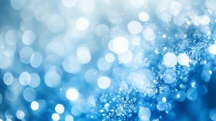 Abstract blue background with bokeh lights.