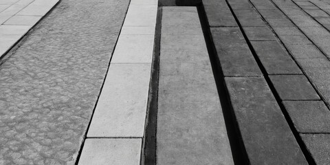 Aufkleber - A black and white photo of a sidewalk with a series of steps