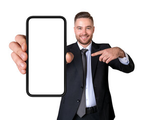 Poster - Smiling man in suit holding smartphone with blank screen, isolated on white background. Concept of mobile marketing, design, or sale promotion