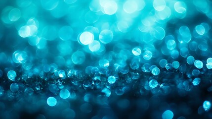 Abstract blue bokeh background with blurred lights.