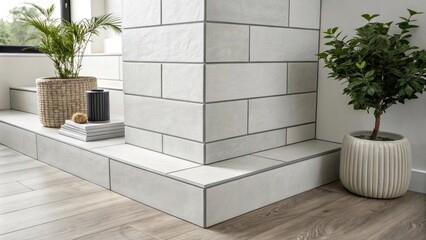 Poster - A minimalist corner featuring a monochromatic stack of mattefinish tiles highlighting sleek lines and a contemporary aesthetic.