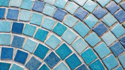 Poster - A closeup view of a mosaic tile pattern in varying shades of blue interspersed with unfinished grout lines that create an artistic unfinished look.