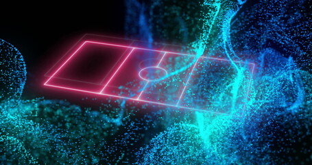 Poster - Digital soccer field image over abstract blue and green particles