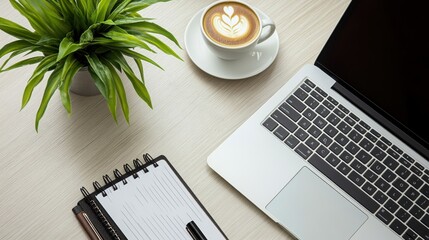 Poster - Top view of workspace on wooden table, consisting of laptop, open notebook with pen, hot coffee and smartphone. Simple and neat design creates an efficient working atmosphere.