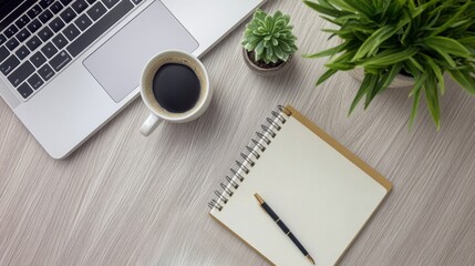 Poster - Top view of workspace on wooden table, consisting of laptop, open notebook with pen, hot coffee and smartphone. Simple and neat design creates an efficient working atmosphere.