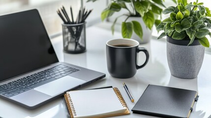 Poster - Create an attractive workspace with a laptop, notebook, pens, coffee cup, and reading glasses on a neutral table for a professional look.