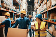 © Davor - Warehouse workers in hard hats checking inventory and lifting boxes