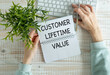 © Pawel - Customer Lifetime Value .CLV .business concept acronym. text on notepad near yellow stickers.