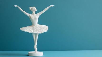 Plaster figurine of a ballerina in motion, capturing grace and artistry