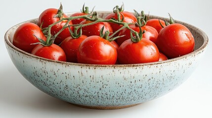 Poster - Aesthetic bowl filled with fresh tomatoes resting on a white surface showcasing vibrant colors and textures of ripe produce
