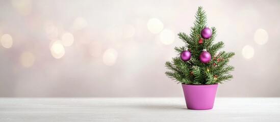 Poster - Christmas tabletop tree decorated with lilac ornaments set against a soft white backdrop with festive bokeh effects adding holiday charm