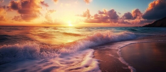 Wall Mural - Calm ocean waves at sunset with golden light reflecting on the water creating a serene beach landscape in nature settings.