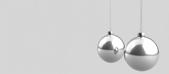 Aufkleber - Shimmering silver Christmas ornaments hanging against a minimalist white background for festive holiday decoration concepts