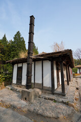 Wall Mural - Miniature landscape of Koreans dwellings in China Ethnic Museum.