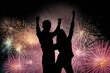 © BillionPhotos.com - Happy young loving couple outdoor watching fireworks.