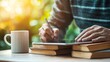 © vixer.std - A person writing on a tablet surrounded by books and a cup in a bright, green environment.