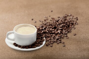 Wall Mural - Coffee cup and beans on  desk background