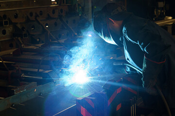 Poster - Crafting metal with precision and artistry in a vibrant workshop