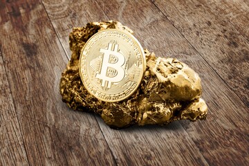 Wall Mural - shiny golden BitcoinCryptocurrency Coin on desk