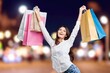 © BillionPhotos.com - Portrait of young woman hold shopping bags